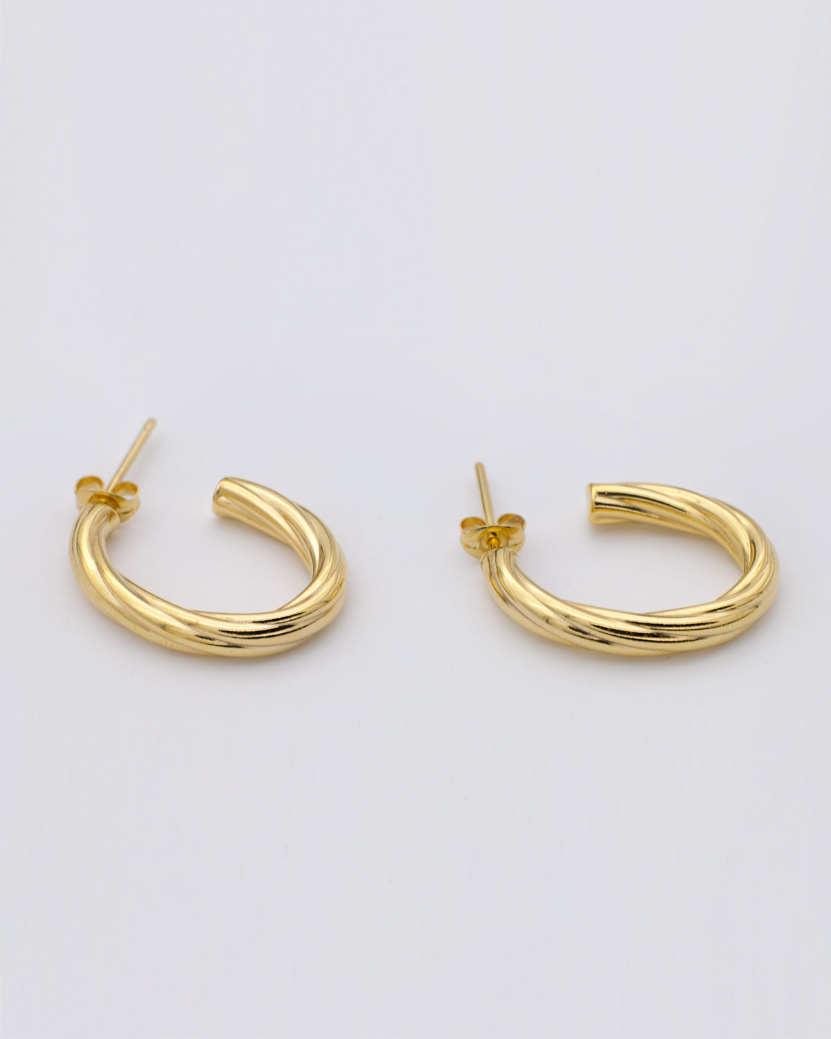 twist gold hoop earrings medium size