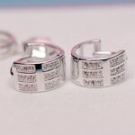 elegant hoop earrings 925 sterling silver blue background