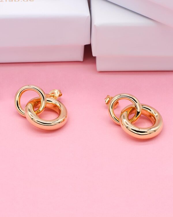 thick statement gold earrings